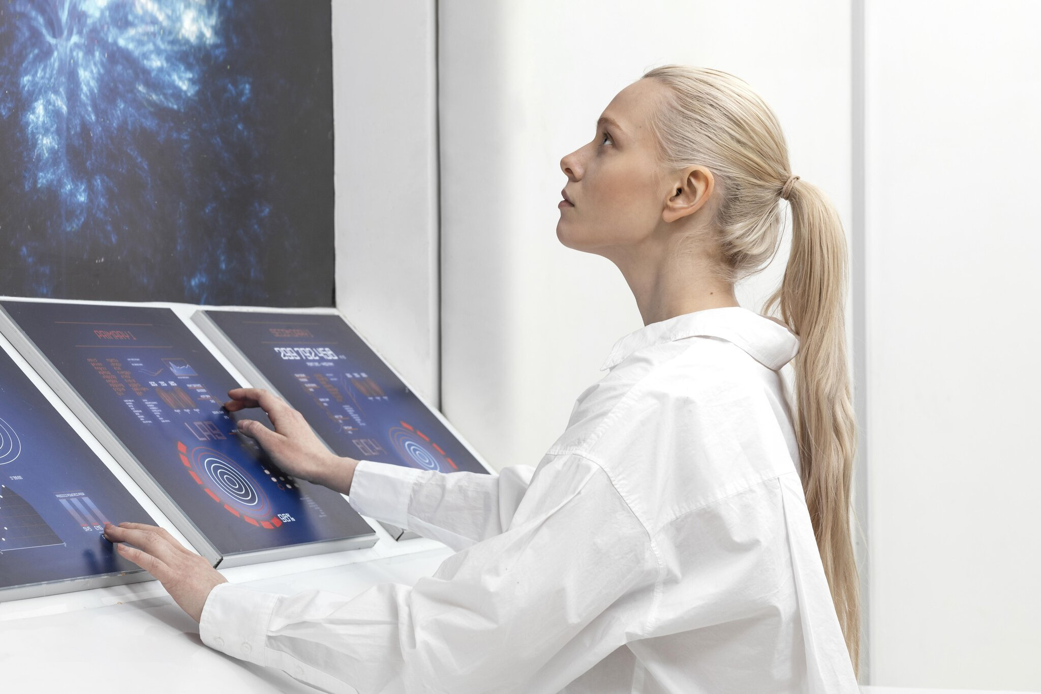 Clinician reviewing AI-driven biomarker analytics on digital monitors in a longevity clinic
